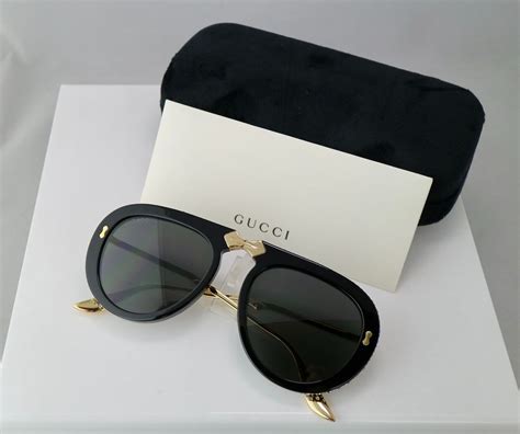 gucci matte black plastic aviator sunglasses|Gucci foldable aviator sunglasses.